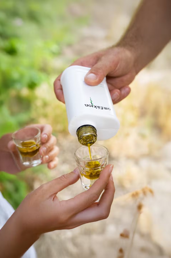 Pouring fresh olive oil for tasting